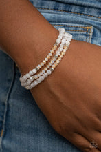 Load image into Gallery viewer, Paparazzi- How Does Your Garden GLOW White Bracelet
